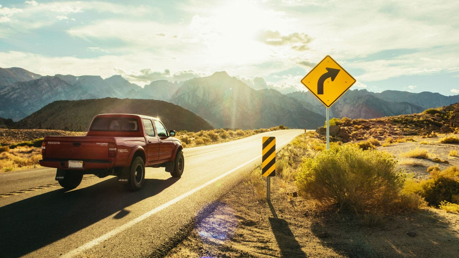Pickup vehicle travelling on an open road